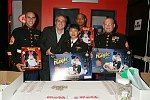 Roger Dreyer of Fantasma Toys with US Marines collectiing for Toys for Tots
