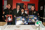 Roger Dreyer of Fantasma Toys with US Marines collectiing for Toys for Tots
