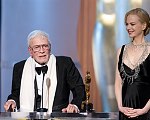 Robert Boyle (left) accepts the Honorary Oscar from Nicole Kidman during the 80th Annual Academy Awards at the Kodak Theatre in Hollywood, CA, on Sunday, February 24, 2008.