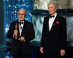 Clint Eastwood presents the Honorary Oscar to Ennio Morricone during the 79th Annual Academy Awards at the Kodak Theatre in Hollywood, CA, on Sunday, February 25, 2007.