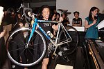 Zang Toi with Lance Armstrong auction item
