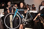 Zang Toi with Lance Armstrong auction item